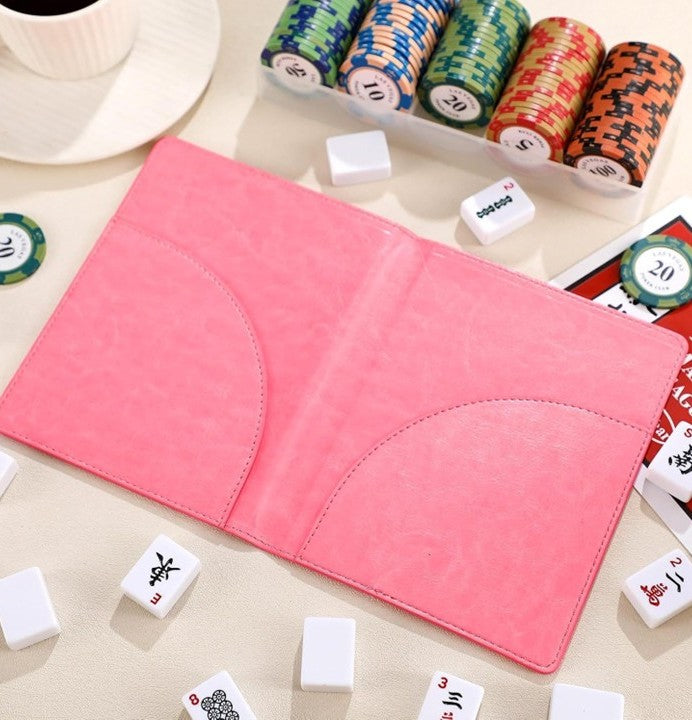 Premium leather NMJL playing card portfolio in soft pink, designed to protect the Official National Mah Jongg League playing card with slim pockets for secure storage. Perfect for American Mahjong players, league games, tournaments, and travel.