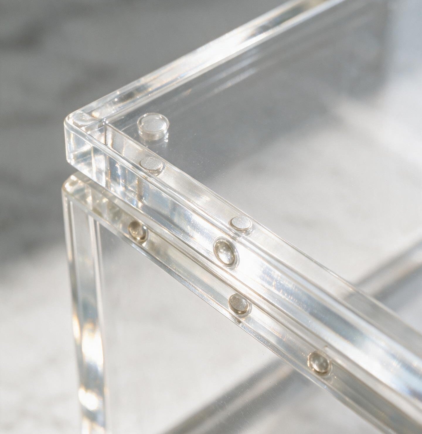 clear acrylic mahjong tile storage box with sliding lid for organizing, protecting, and displaying American mahjong tiles.